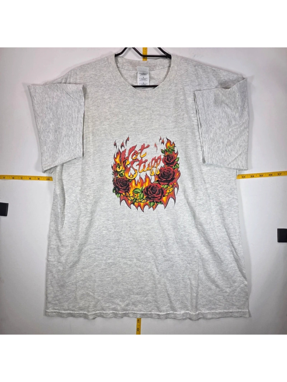 vintage biker-style graphic t-shirt featuring a central "Hot Stuff"